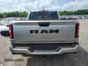 2025 Ram 1500 Tradesman with VIN 1C6RREGG1SN645797, listed as a Copart auction lot 61264645 with 2,386 mi miles and Salvage title. Bid and sale history available at DreamBid. Image 6.