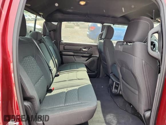 2025 Ram 1500 Tradesman with VIN 1C6RRFGG7SN606380, listed as a Copart auction lot 64974215 with 15,603 mi miles and Salvage title. Bid and sale history available at DreamBid. Image 10.