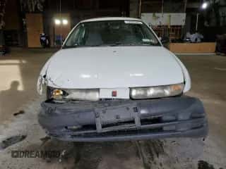 1999 Saturn SL с VIN 1G8ZH528XXZ235067, выставлен на аукционе Copart как лот 74508564 с пробегом 155 180 миль миль и Списание • Salvage title. История ставок и продаж доступна на DreamBid. Изображение 5.