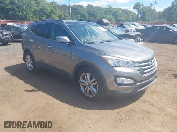 2015 Hyundai Santa Fe z VIN 5XYZWDLA4FG262429, wystawiony jako IAAI lot #43118323 z przebiegiem 105 391 mil mil oraz . Historia ofert i sprzedaży dostępna na DreamBid. Obrazek 1.