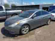 2012 Hyundai Sonata SE z VIN 5NPEC4AC4CH391092, wystawiony jako IAAI lot #43241155 z przebiegiem 137 266 mil mil oraz . Historia ofert i sprzedaży dostępna na DreamBid. Obrazek 2.