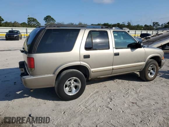 2002 Chevrolet Blazer LS with VIN 1GNCS13W62K125399, listed as a Copart auction lot 88986855 with 147,128 mi miles and Salvage title. Bid and sale history available at DreamBid. Image 3.