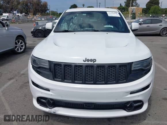 2014 Jeep Grand Cherokee SRT-8 z VIN 1C4RJFDJ7EC536055, wystawiony jako IAAI lot #42194498 z przebiegiem 80 241 mil mil oraz . Historia ofert i sprzedaży dostępna na DreamBid. Obrazek 6.