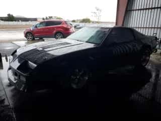 1986 Chevrolet Camaro Z28 Sport z VIN 1G1FP87H8GL106911, wystawiony jako Copart lot #81903004 z przebiegiem 24 202 mil mil oraz Szkoda całkowita • Salvage title. Historia ofert i sprzedaży dostępna na DreamBid. Obrazek 1.