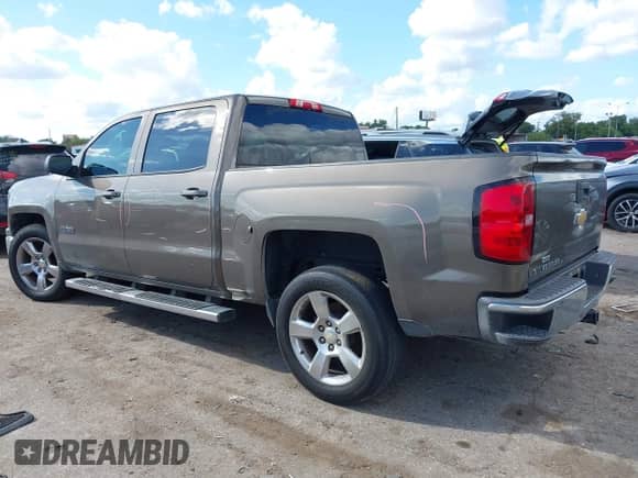 2014 Chevrolet Silverado 1500 LT z VIN 3GCPCREC9EG401885, wystawiony jako IAAI lot #43273797 z przebiegiem 216 606 mil mil oraz . Historia ofert i sprzedaży dostępna na DreamBid. Obrazek 3.