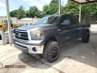 2012 Toyota Tundra z VIN 5TFRY5F17CX120323, wystawiony jako Copart lot #62028755 z przebiegiem 224 248 mil mil oraz Szkoda całkowita • Salvage title. Historia ofert i sprzedaży dostępna na DreamBid. Obrazek 1.