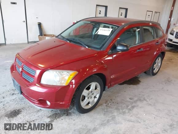 2008 Dodge Caliber SXT with VIN 1B3HB48BX8D764454, listed as a IAAI auction lot 43446928 with 143,857 mi miles and . Bid and sale history available at DreamBid. Image 2.