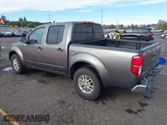 2016 Nissan Frontier SV with VIN 1N6AD0EV7GN750048, listed as a IAAI auction lot 43334744 with 105,698 mi miles and . Bid and sale history available at DreamBid. Image 3.