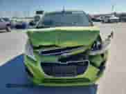 2014 Chevrolet Spark LS with VIN KL8CB6S94EC565436, listed as a Copart auction lot 86057295 with 106,927 mi miles and Salvage title. Bid and sale history available at DreamBid. Image 5.