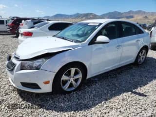 2013 Chevrolet Cruze 2LT с VIN 1G1PE5SBXD7322730, выставлен на аукционе Copart как лот 80208065 с пробегом 176 700 миль миль и Списание • Salvage title. История ставок и продаж доступна на DreamBid. Изображение 1.