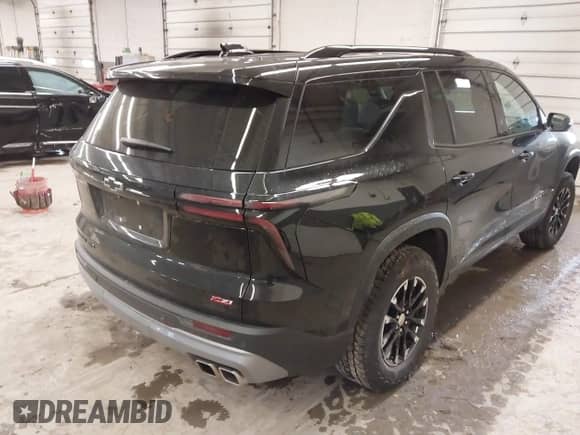 2024 Chevrolet Traverse AWD Z71 z VIN 1GNEVJKS7RJ198778, wystawiony jako IAAI lot #41729998 z przebiegiem 8 051 mil mil oraz . Historia ofert i sprzedaży dostępna na DreamBid. Obrazek 4.