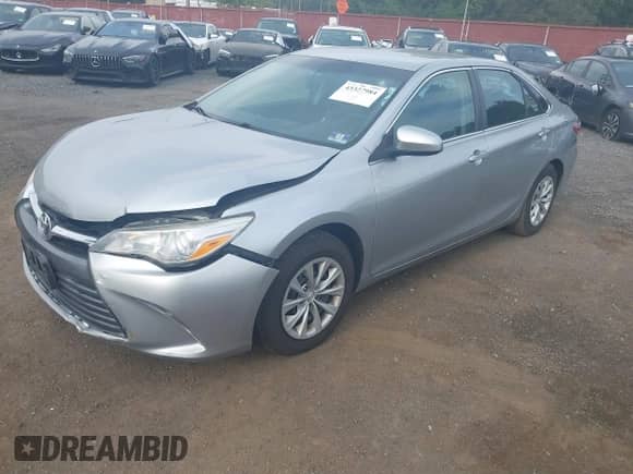 2015 Toyota Camry LE z VIN 4T4BF1FK2FR453576, wystawiony jako IAAI lot #43327984 z przebiegiem 129 041 mil mil oraz . Historia ofert i sprzedaży dostępna na DreamBid. Obrazek 2.