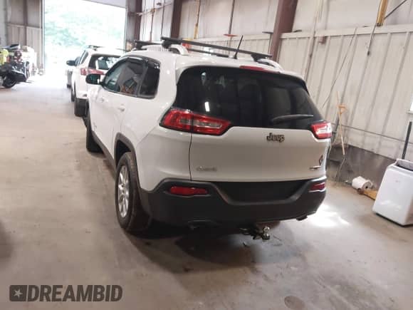 2014 Jeep Cherokee Latitude with VIN 1C4PJMCS1EW121625, listed as a IAAI auction lot 42992879 with 93,944 mi miles and . Bid and sale history available at DreamBid. Image 3.