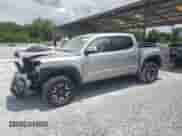 2020 Toyota Tacoma SR5 с VIN 5TFAZ5CN1LX090978, выставлен на аукционе Copart как лот 64010265 с пробегом 117 433 миль миль и Списание • Salvage title. История ставок и продаж доступна на DreamBid. Изображение 1.