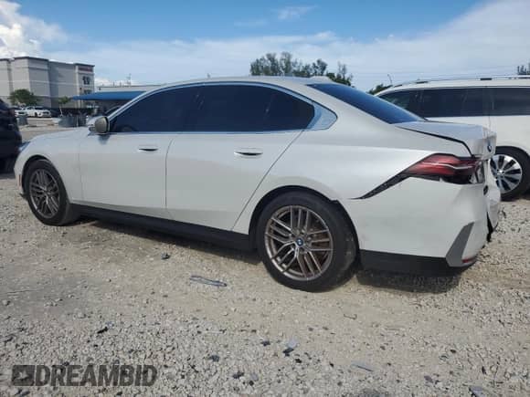 2024 BMW 5 Series 530i with VIN WBA43FJ00RCS12139, listed as a Copart auction lot 80700535 with 38,908 mi miles and Salvage title. Bid and sale history available at DreamBid. Image 2.