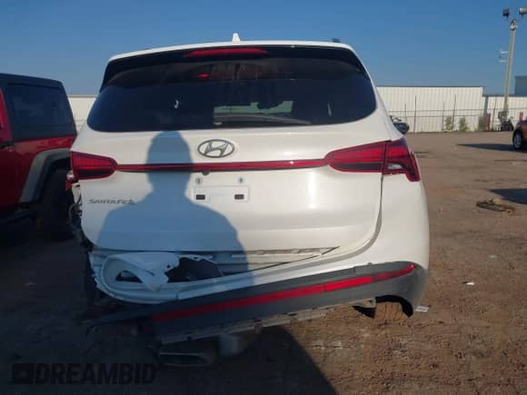 2021 Hyundai Santa Fe SEL z VIN 5NMS24AJ6MH318230, wystawiony jako IAAI lot #43106688 z przebiegiem 63 291 mil mil oraz . Historia ofert i sprzedaży dostępna na DreamBid. Obrazek 16.