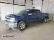 2016 Chevrolet Silverado 1500 LT with VIN 1GCUKREC9GF164552, listed as a Copart auction lot 52196485 with 105,668 mi miles and Salvage title. Bid and sale history available at DreamBid. Image 1.