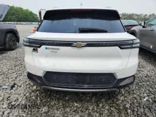 2024 Chevrolet Equinox EV LT с VIN 3GN7DMRP7RS282127, выставлен на аукционе Copart как лот 67010005 с пробегом 7 902 миль миль и Списание • Salvage title. История ставок и продаж доступна на DreamBid. Изображение 6.