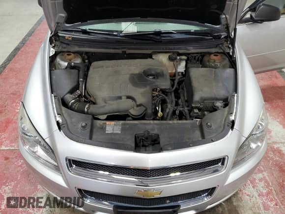 2012 Chevrolet Malibu 1LS z VIN 1G1ZB5E09CF286447, wystawiony jako Copart lot #82565885 z przebiegiem 110 793 mil mil oraz Szkoda całkowita • Salvage title. Historia ofert i sprzedaży dostępna na DreamBid. Obrazek 12.