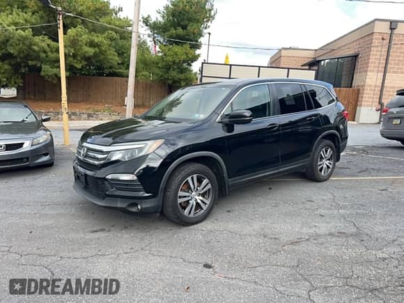 2017 Honda Pilot EX-L with VIN 5FNYF6H55HB062124, listed as a Copart auction lot 86861675 with 180,692 mi miles and Clean title. Bid and sale history available at DreamBid. Image 2.