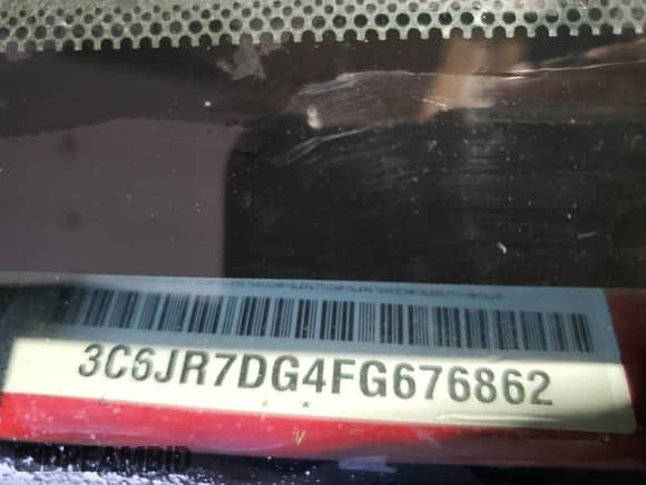 2015 Ram 1500 Tradesman with VIN 3C6JR7DG4FG676862, listed as a Copart auction lot 58736925 with 81,865 mi miles and Salvage title. Bid and sale history available at DreamBid. Image 12.