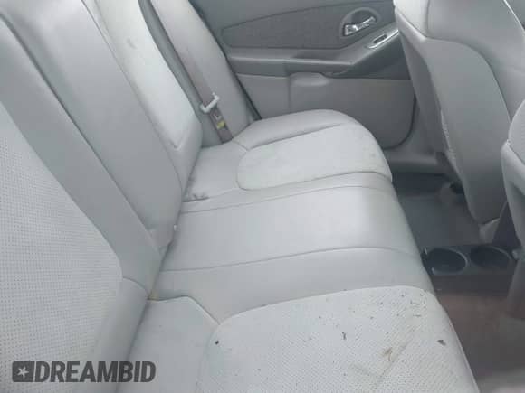 2005 Chevrolet Malibu LT z VIN 1G1ZU54815F250983, wystawiony jako IAAI lot #42358754 z przebiegiem 250 010 mil mil oraz . Historia ofert i sprzedaży dostępna na DreamBid. Obrazek 8.