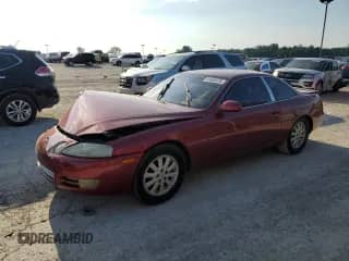 1992 Lexus SC 400 z VIN JT8UZ30C8N0002863, wystawiony jako Copart lot #69550415 z przebiegiem 141 192 mil mil oraz Szkoda całkowita • Salvage title. Historia ofert i sprzedaży dostępna na DreamBid. Obrazek 1.