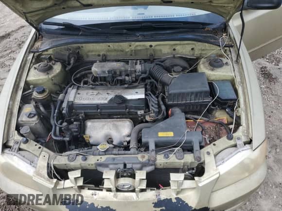 2002 Hyundai Accent GL z VIN KMHCG45C02U296132, wystawiony jako Copart lot #59401835 z przebiegiem 115 421 mil mil oraz Czysty tytuł • Clean title. Historia ofert i sprzedaży dostępna na DreamBid. Obrazek 11.