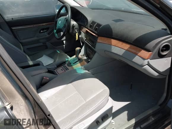 1999 BMW 5 Series 528i with VIN WBADM6333XBY24603, listed as a IAAI auction lot 42165015 with Not provided miles and . Bid and sale history available at DreamBid. Image 5.