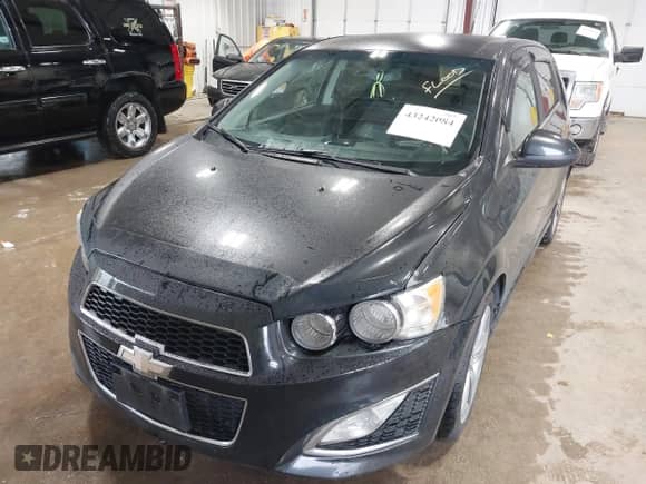 2014 Chevrolet Sonic RS with VIN 1G1JG6SB5E4210541, listed as a IAAI auction lot 43242084 with 146,454 mi miles and . Bid and sale history available at DreamBid. Image 6.