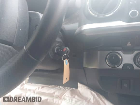 2022 Toyota Tacoma SR with VIN 3TYSX5EN9NT014347, listed as a IAAI auction lot 41631557 with 10 mi miles and . Bid and sale history available at DreamBid. Image 11.