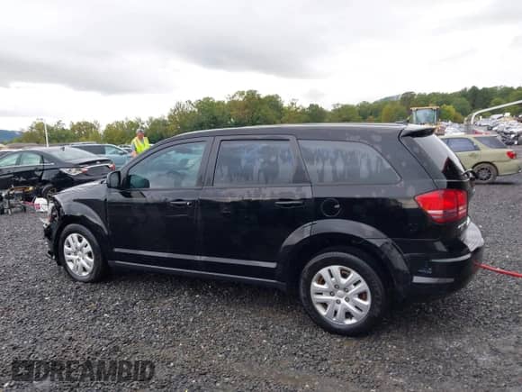 2015 Dodge Journey American Value with VIN 3C4PDCAB9FT737472, listed as a IAAI auction lot 43342746 with 102,970 mi miles and . Bid and sale history available at DreamBid. Image 14.