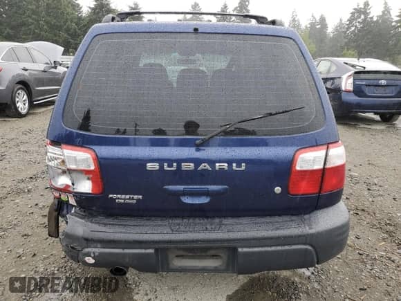 2002 Subaru Forester L with VIN JF1SF63592H753585, listed as a Copart auction lot 67861345 with 134,798 mi miles and Salvage title. Bid and sale history available at DreamBid. Image 6.