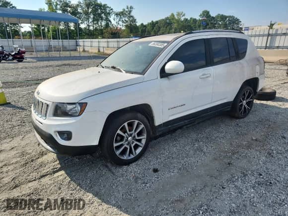2016 Jeep Compass Latitude with VIN 1C4NJCEA7GD777378, listed as a Copart auction lot 56390385 with 123,186 mi miles and Salvage title. Bid and sale history available at DreamBid. Image 1.