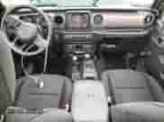 2021 Jeep Wrangler Unlimited Willys Sport with VIN 1C4HJXDN1MW679133, listed as a Copart auction lot 58345635 with 62,375 mi miles and Salvage title. Bid and sale history available at DreamBid. Image 8.