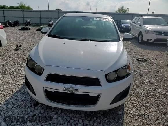 2012 Chevrolet Sonic LS с VIN 1G1JB5SHXC4182438, выставлен на аукционе Copart как лот 61587725 с пробегом 260 014 миль миль и На запчасти • Non repairable. История ставок и продаж доступна на DreamBid. Изображение 14.