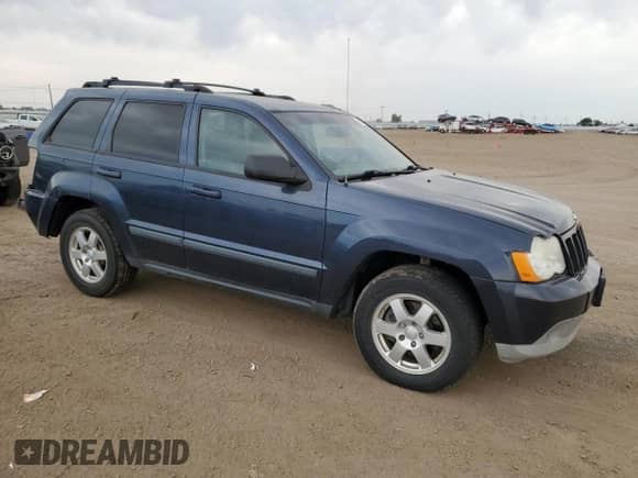 2009 Jeep Grand Cherokee Laredo с VIN 1J8HR48P49C516660, выставлен на аукционе Copart как лот 67833435 с пробегом 223 719 миль миль и Списание • Salvage title. История ставок и продаж доступна на DreamBid. Изображение 4.