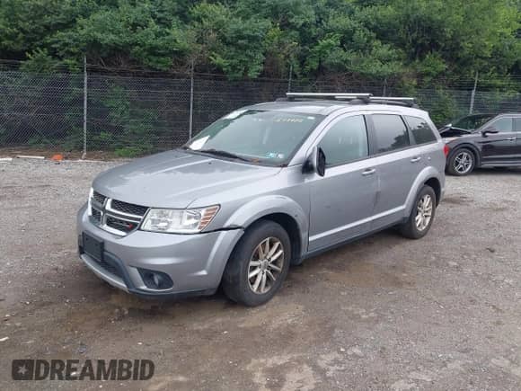 2017 Dodge Journey SXT with VIN 3C4PDDBG8HT577782, listed as a IAAI auction lot 42409731 with 136,618 mi miles and . Bid and sale history available at DreamBid. Image 18.