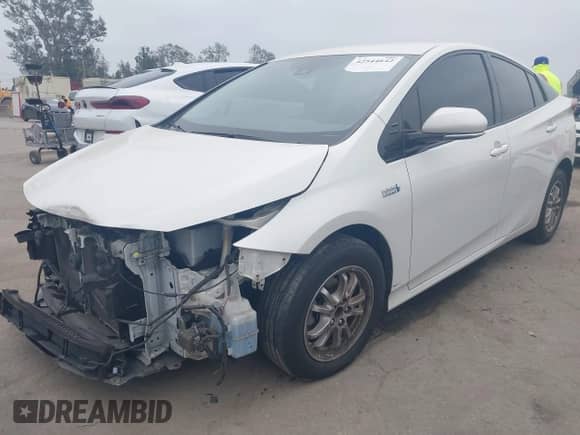 2018 Toyota Prius Plus z VIN JTDKARFP9J3089162, wystawiony jako IAAI lot #42544642 z przebiegiem 50 746 mil mil oraz . Historia ofert i sprzedaży dostępna na DreamBid. Obrazek 18.