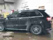 2017 Jeep Grand Cherokee Summit with VIN 1C4RJFJTXHC672075, listed as a IAAI auction lot 41597370 with 136,659 mi miles and . Bid and sale history available at DreamBid. Image 14.