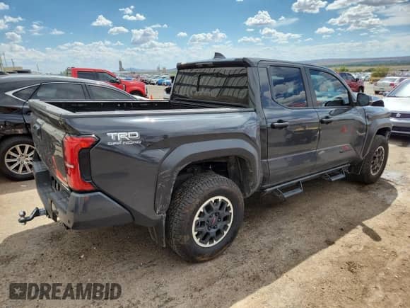 2024 Toyota Tacoma TRD Off Road with VIN 3TMLB5JN7RM003373, listed as a Copart auction lot 69316065 with 45,905 mi miles and Salvage title. Bid and sale history available at DreamBid. Image 3.