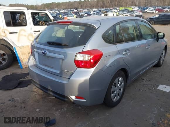 2015 Subaru Impreza 2.0i with VIN JF1GPAA65F9288322, listed as a IAAI auction lot 41336413 with 73,785 mi miles and . Bid and sale history available at DreamBid. Image 4.