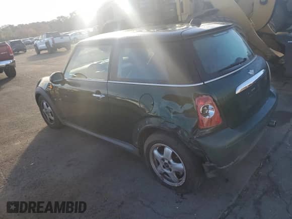 2011 MINI Hardtop with VIN WMWSU3C59BT253726, listed as a Copart auction lot 87220845 with 123,389 mi miles and Salvage title. Bid and sale history available at DreamBid. Image 2.