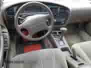 1995 Toyota Camry с VIN 4T1SK13E8SU587457, выставлен на аукционе Copart как лот 80878074 с пробегом 241 397 миль миль и Списание • Salvage title. История ставок и продаж доступна на DreamBid. Изображение 8.