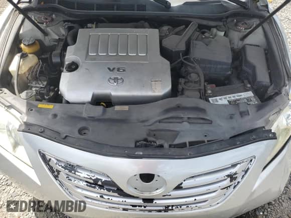 2007 Toyota Camry LE with VIN 4T1BK46K97U555689, listed as a Copart auction lot 71016945 with 213,560 mi miles and Salvage title. Bid and sale history available at DreamBid. Image 11.