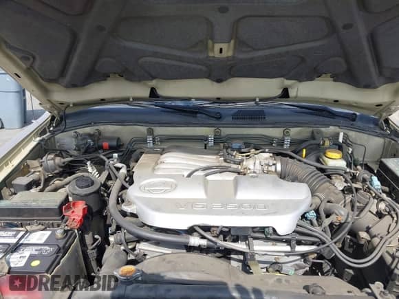 2001 Nissan Pathfinder LE z VIN JN8DR09X11W577615, wystawiony jako IAAI lot #42783525 z przebiegiem 148 627 mil mil oraz . Historia ofert i sprzedaży dostępna na DreamBid. Obrazek 10.