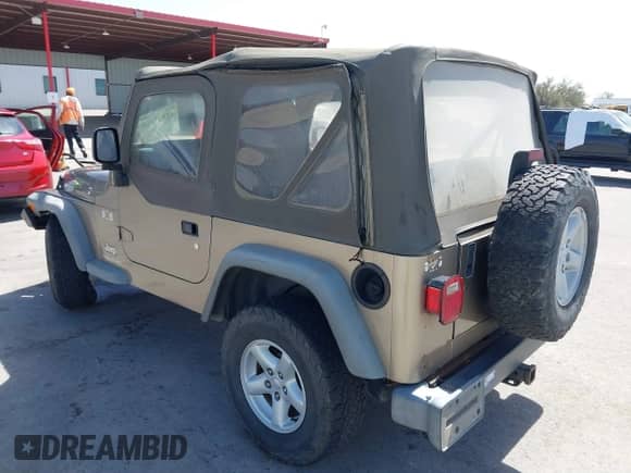 2003 Jeep Wrangler X with VIN 1J4FA39S03P312550, listed as a IAAI auction lot 41837150 with 127,239 mi miles and . Bid and sale history available at DreamBid. Image 3.