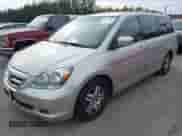 2007 Honda Odyssey EX z VIN 5FNRL38407B411904, wystawiony jako IAAI lot #43516250 z przebiegiem 151 533 mil mil oraz . Historia ofert i sprzedaży dostępna na DreamBid. Obrazek 2.