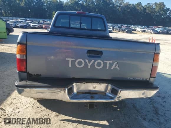 1997 Toyota Tacoma z VIN 4TAWM72N4VZ256544, wystawiony jako Copart lot #86303685 z przebiegiem 245 875 mil mil oraz Szkoda całkowita • Salvage title. Historia ofert i sprzedaży dostępna na DreamBid. Obrazek 6.
