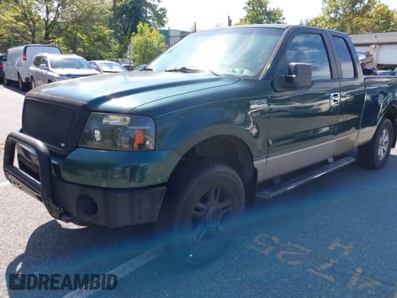 2007 Ford F-150 XLT with VIN 1FTPX14V67NA07991, listed as a IAAI auction lot 43329701 with 235,724 mi miles and . Bid and sale history available at DreamBid. Image 4.